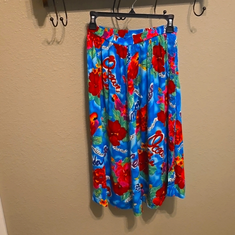 Vintage Skirt! 100%Rayon and  size Small. Buttons down one side. Carole Little.